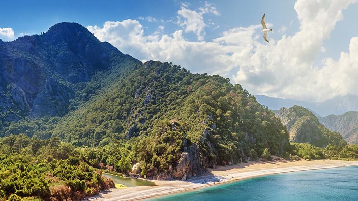 Lycian Way Coastal Walks Walking along the Pirate Coast of Lycia with wildflowers and cliffs